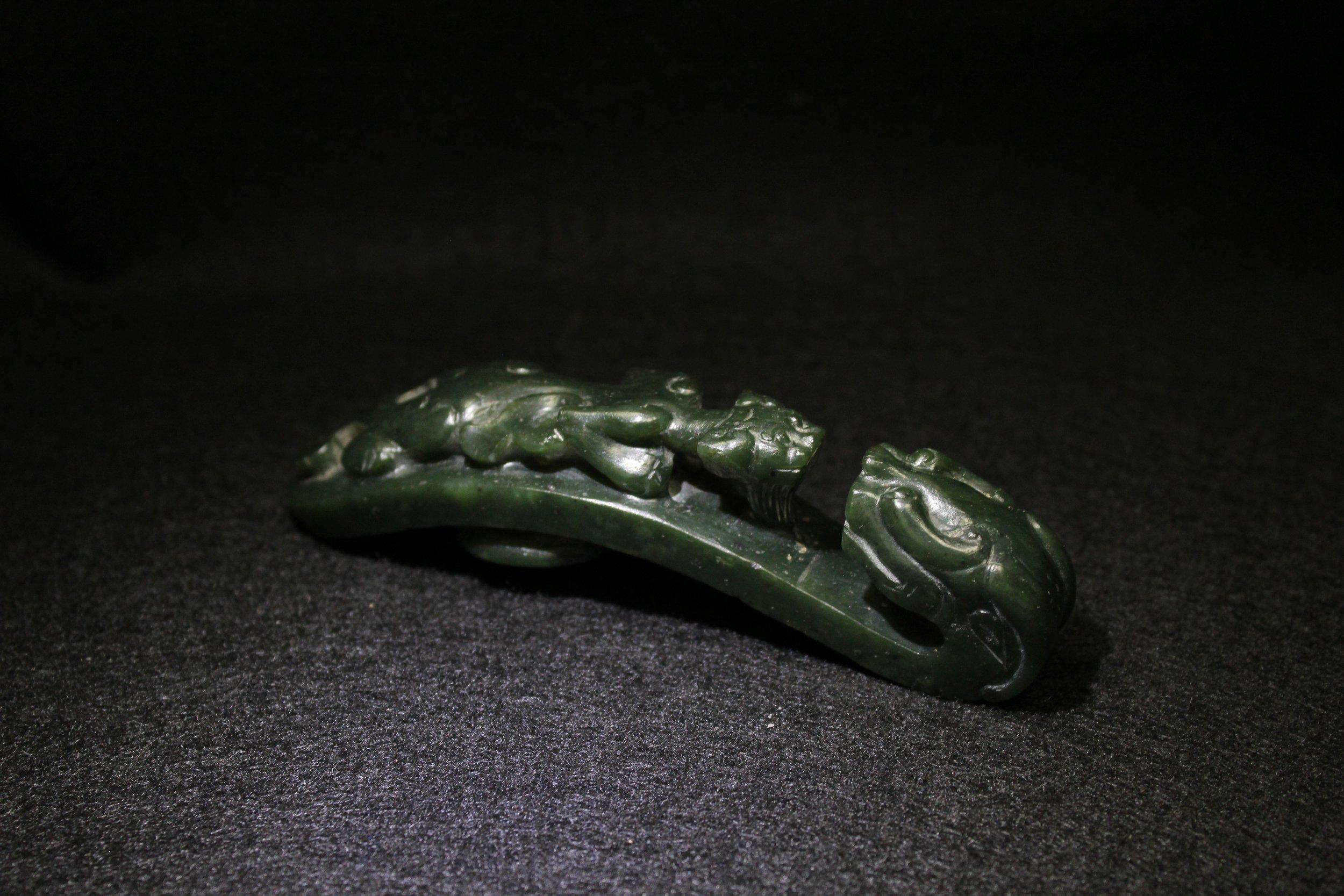 A Spinach-Green Jade 'Chilong' Belt Hook, Qing Dynasty 3