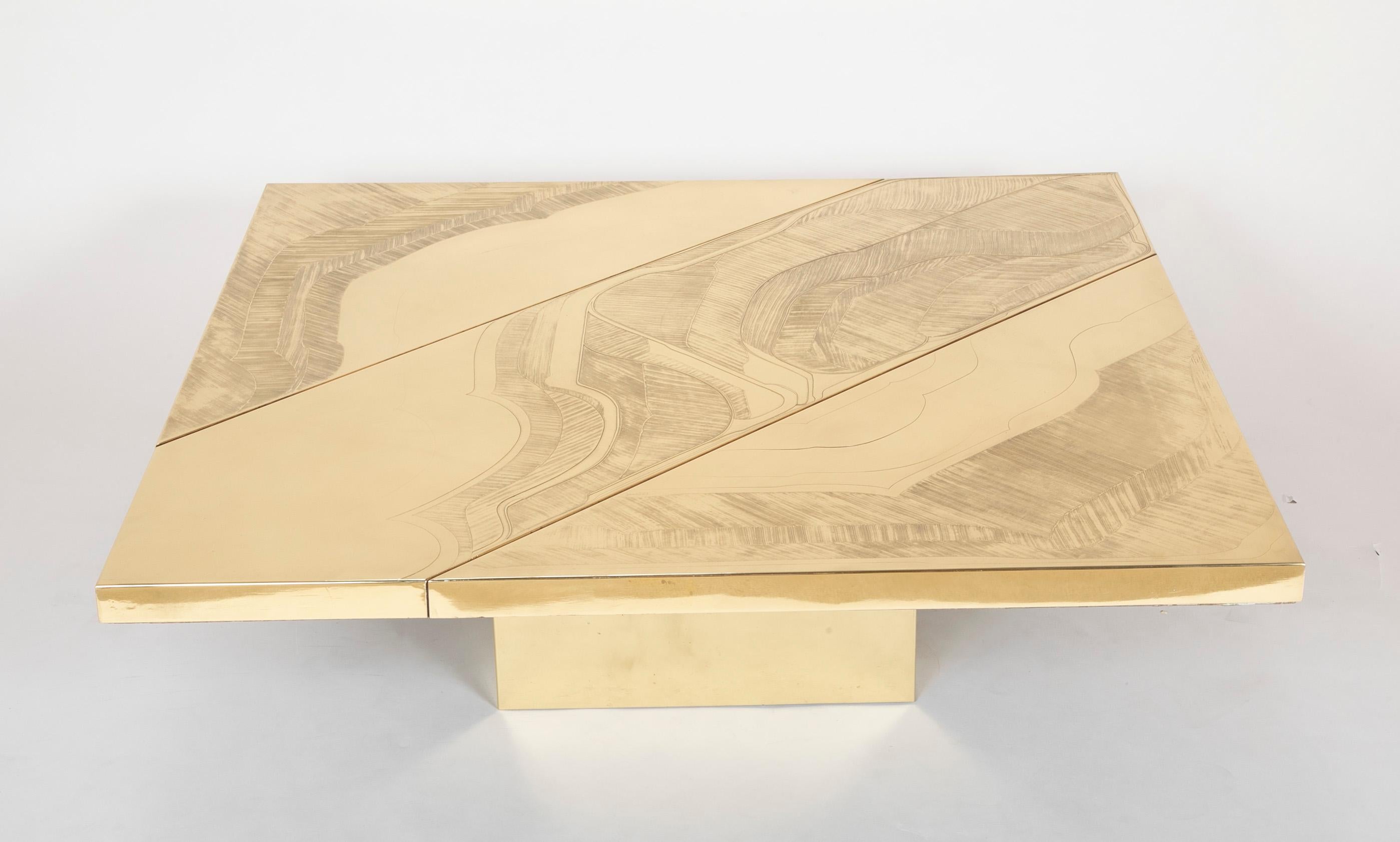 A signed acid etched and shaped brass coffee table. Designed in Belgium by Jenalzi, circa 1970.