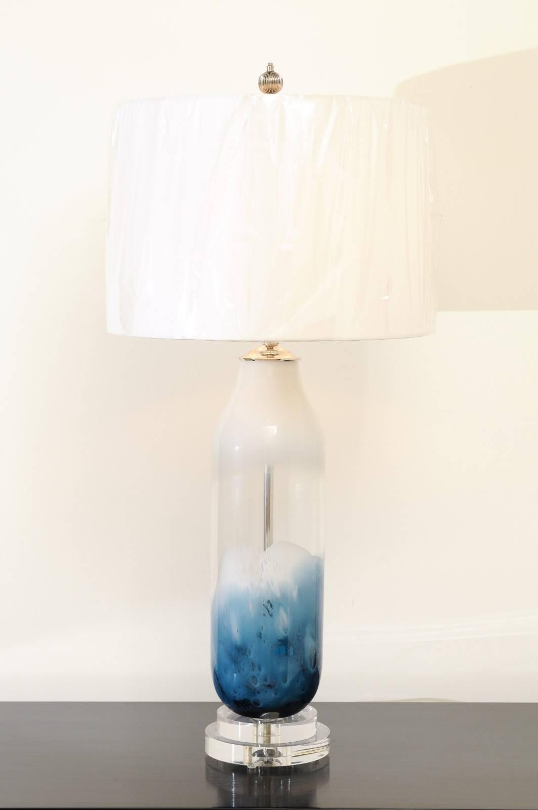 A Killer pair of large-scale Italian glass vessels, circa 1980, as newly built custom lamps. Beautiful slender form with swirl accent colors in blue and cream which recall clouds. Stellar pieces exactingly constructed using components of only the