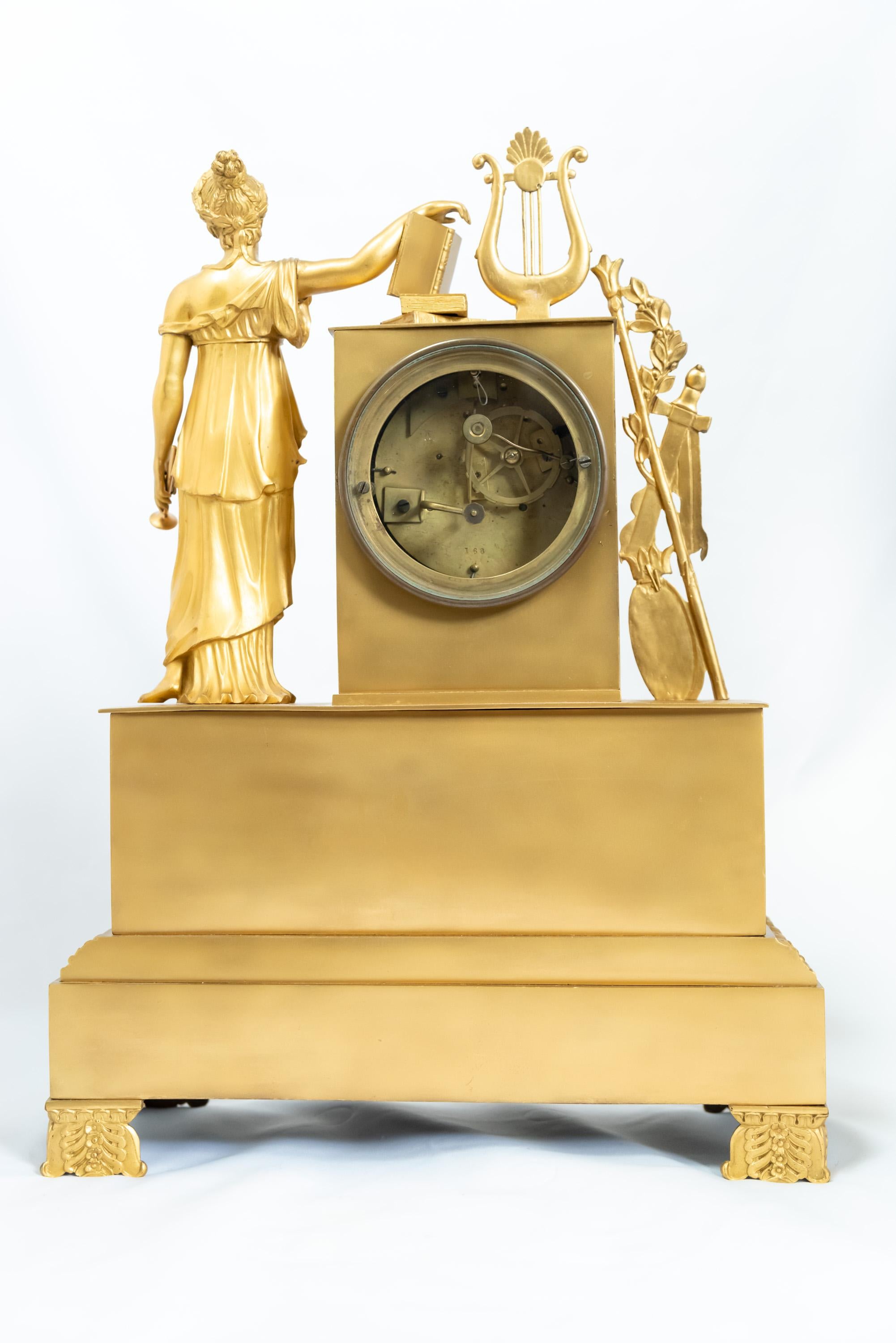 19th Century A Standing Figure French Restauration Era Fire-Gilt Clock For Sale