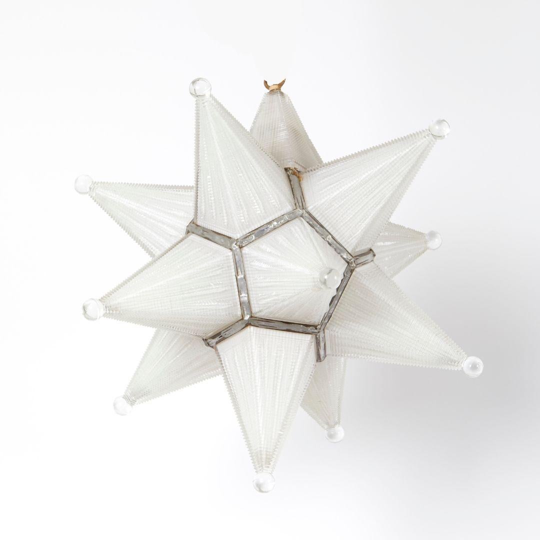 American A Star-Shaped Holocene Glass Pendant
