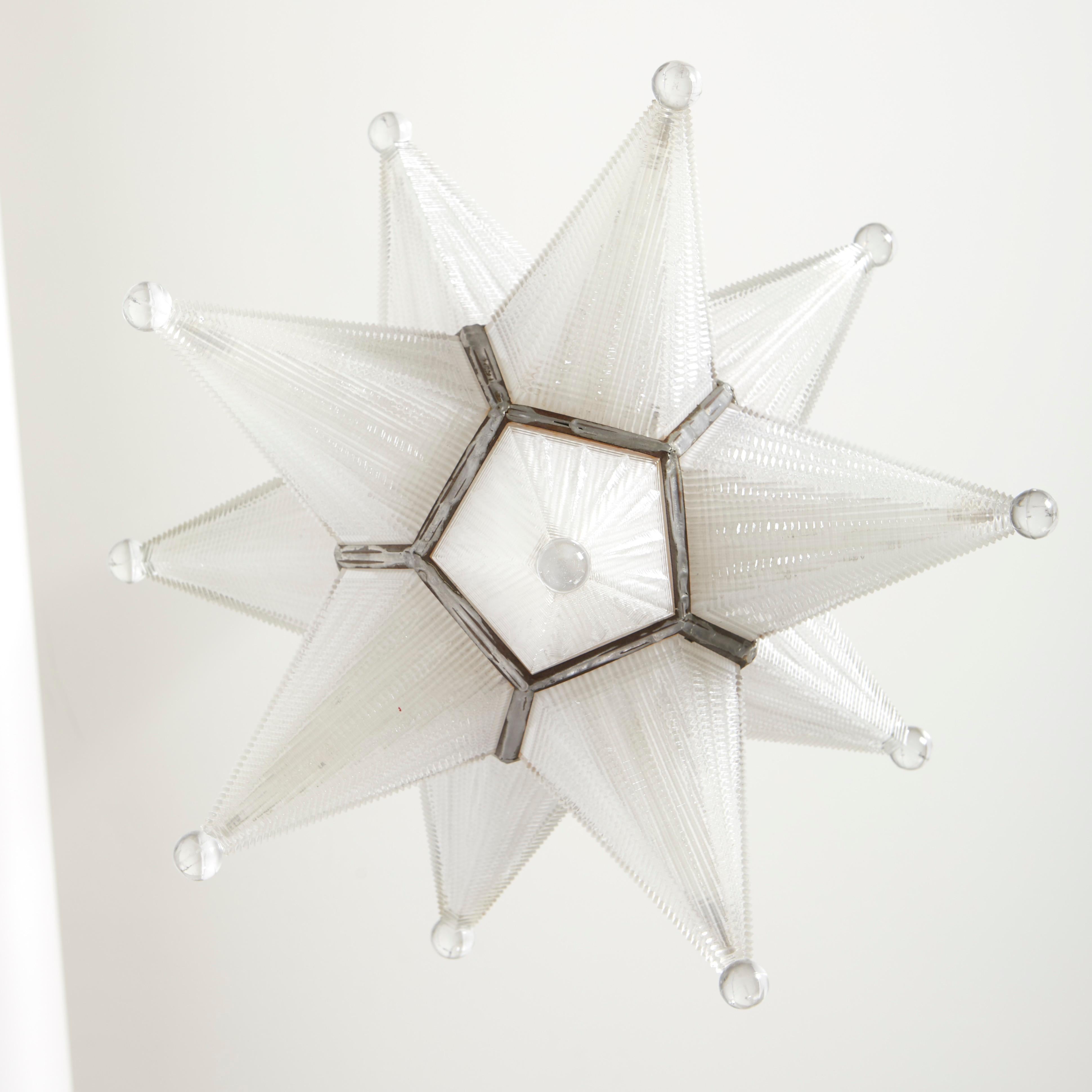 A Star-Shaped Holocene Glass Pendant In Good Condition In New York, NY