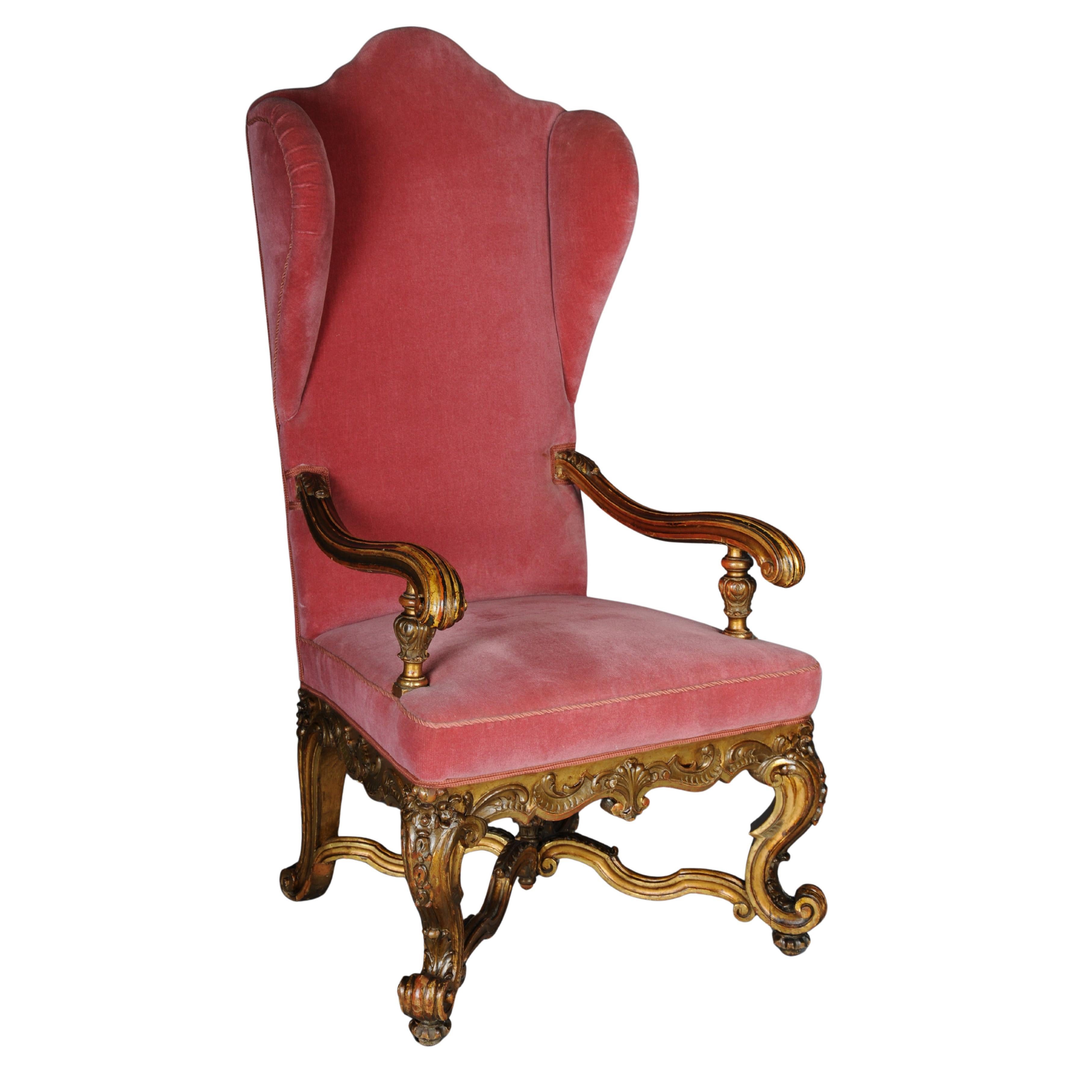 Un imposant fauteuil baroque, doré, vers 1870