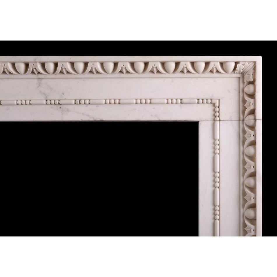 A Statuary white marble fireplace in the architectural style. The inner moulding with sausage-and-pea moulding, the outer moulding carved with egg-and-tongue, with acanthus leaves to corners. English, period 18th century. (NB. Depth of fireplace