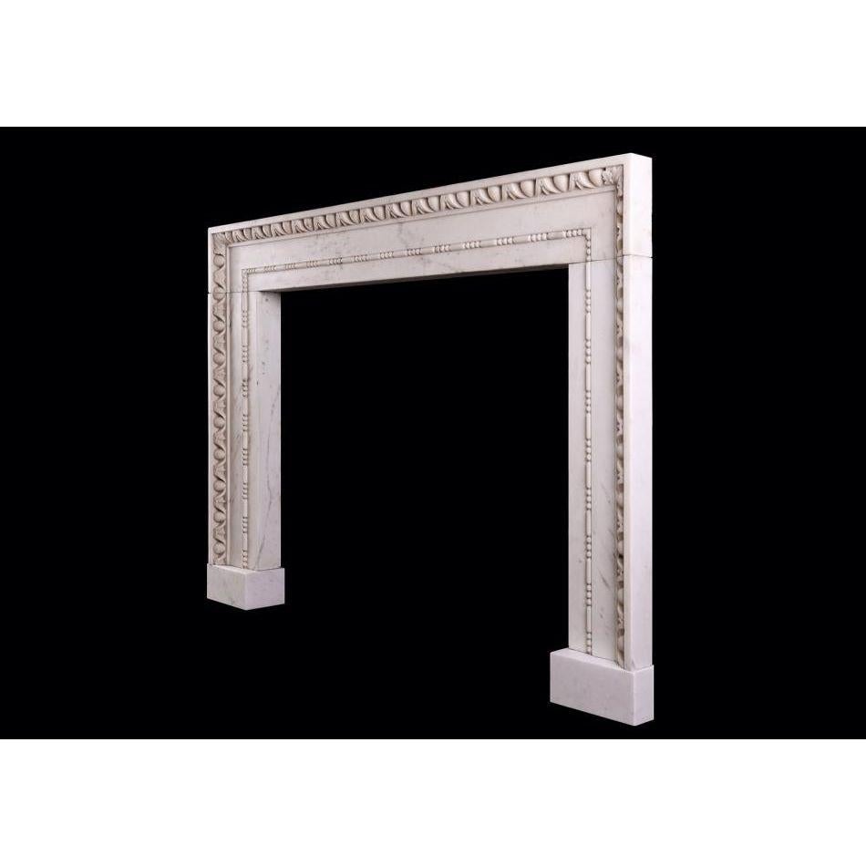 English A Statuary Marble Fireplace in the Architectural Style For Sale
