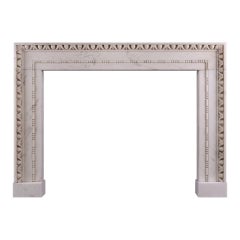 A Statuary Marble Fireplace in the Architectural Style