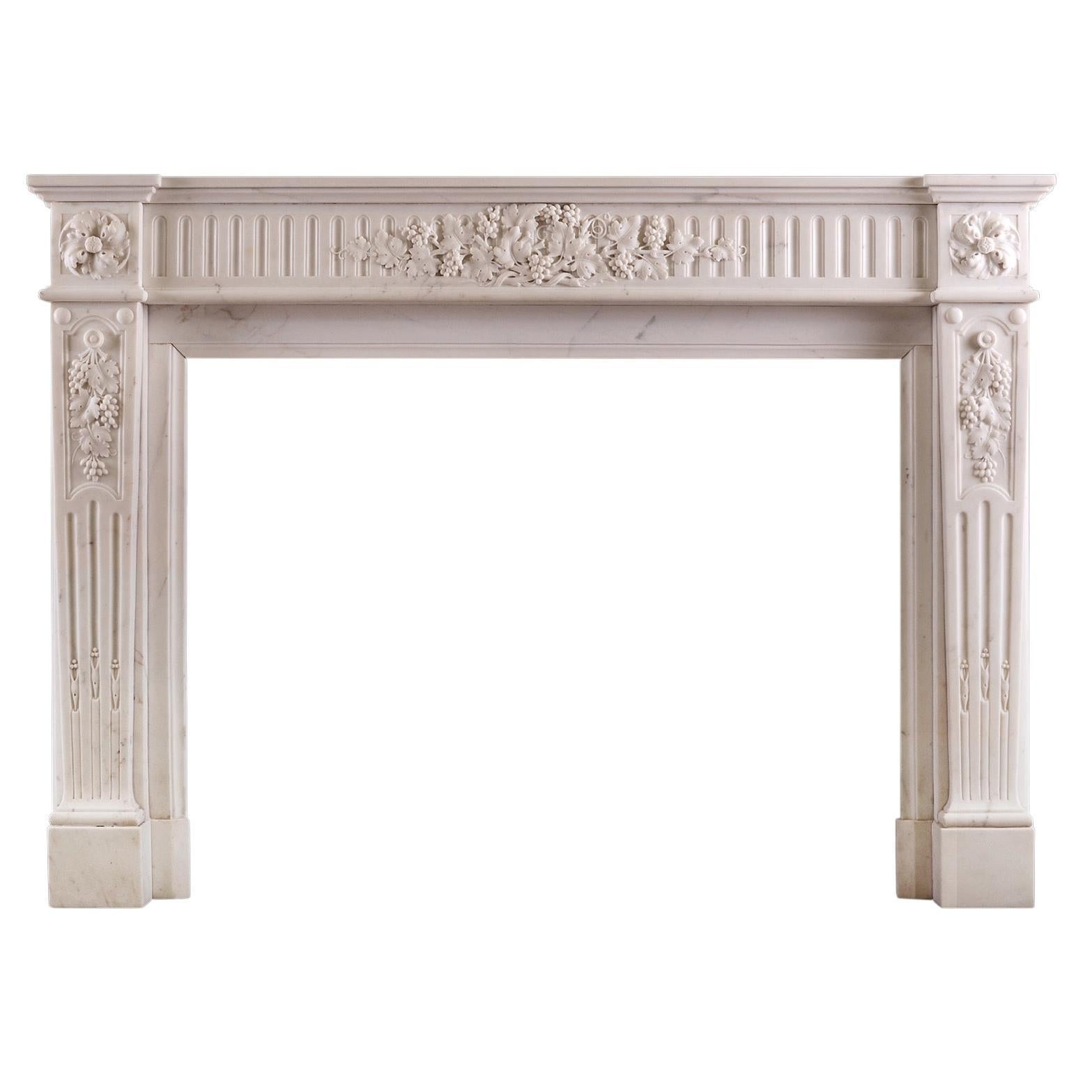 Statuary Marble Fireplace in the Louis XVI Style For Sale