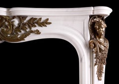 A Statuary Marble Fireplace With Bronze Ormolu
