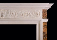 A Statuary Marble Fireplace with Italian Sienna Marble Inlay