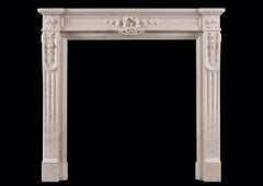 A Statuary White Marble Fireplace in the Louis XVI Style