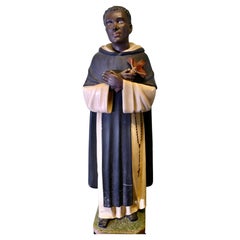 A Statue of Saint Martín de Porres Velázquez OP  A Statue of Saint Martín