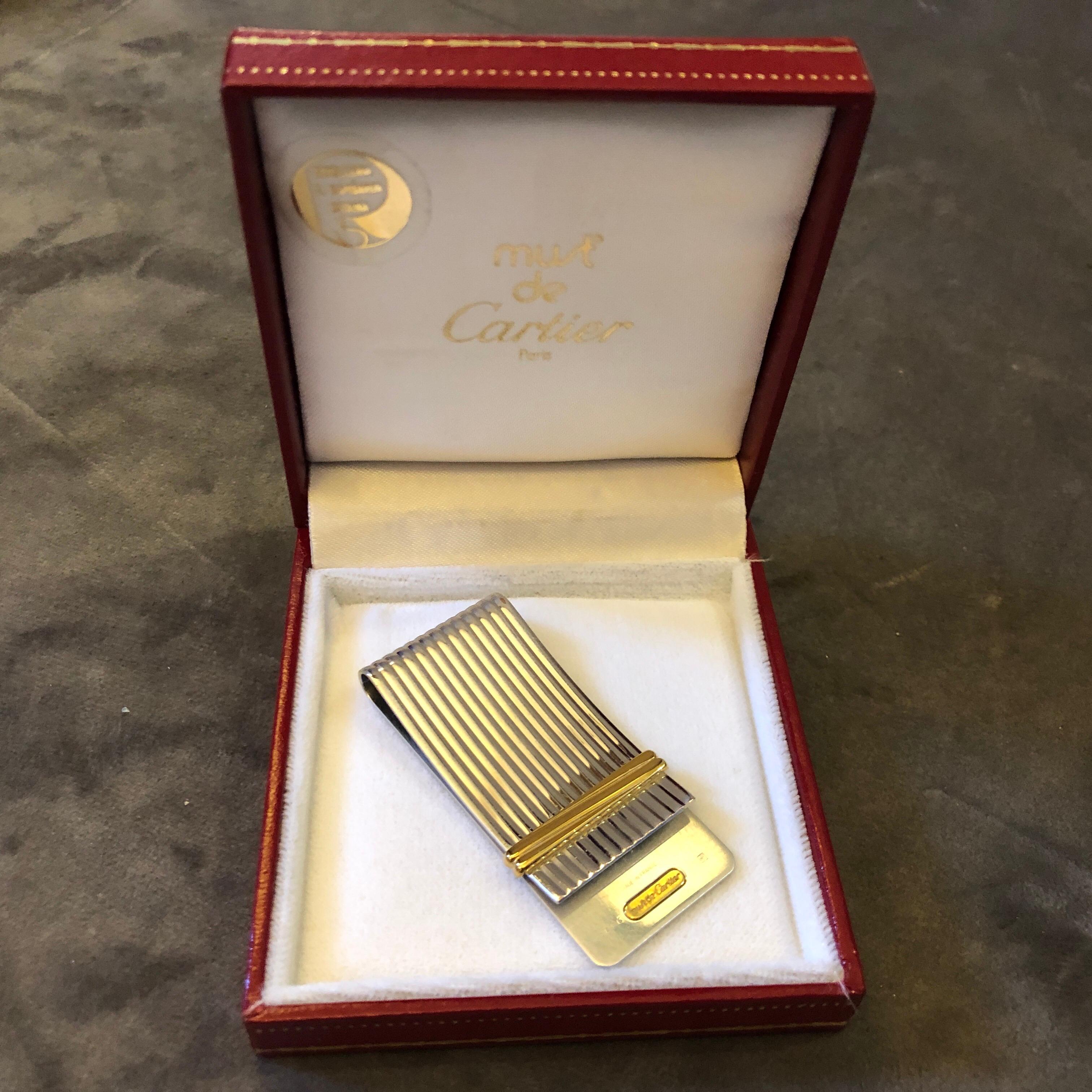 A money clips signed Cartier in the original box. It's in lovely conditions, probably never used.