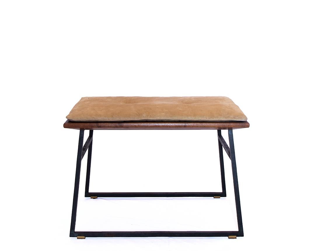A unique stool with blackened steel base, brass feet and a slatted walnut seat with suede pancake squab cushion. Designed by Chester Jones for a Private Collector