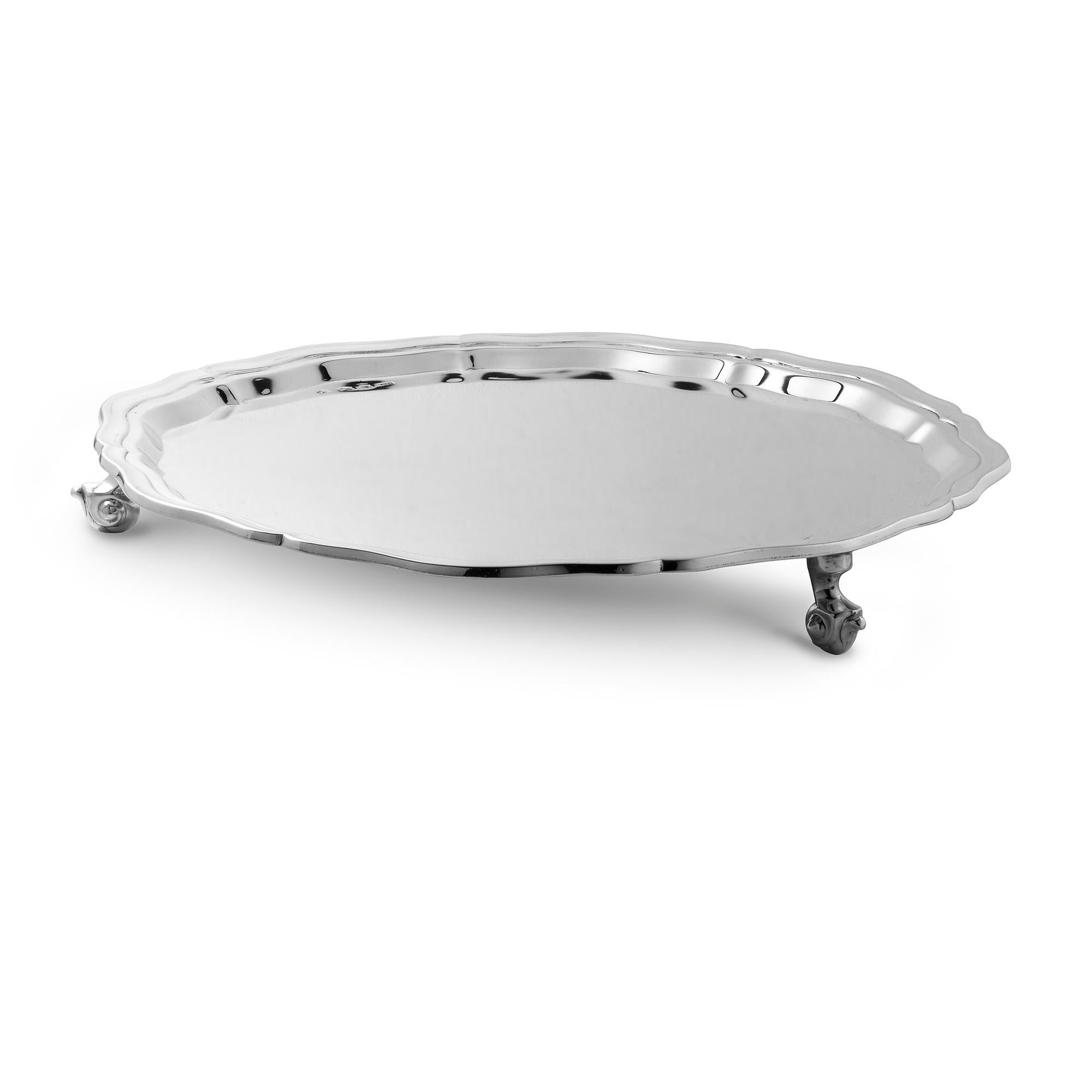 A sterling silver chippendale style salver on three feet, 10