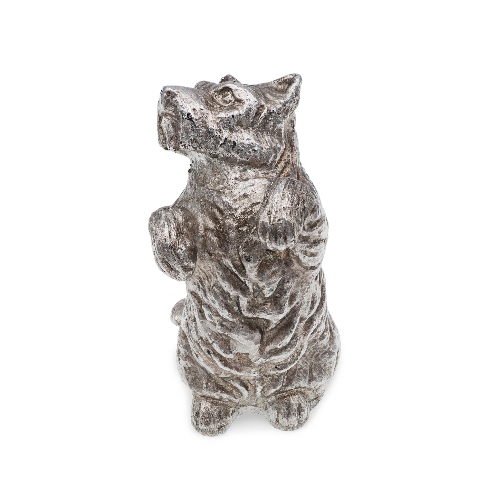 A cast sterling silver dog model, height 6cms, weight 107.8gms, hallmarked London, bearing the Bentley & Skinner sponsor mark. 

Should you choose to make this purchase we will delighted to send it to you beautifully gift-wrapped in a Bentley &