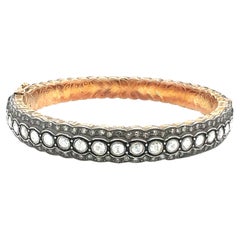 A sterling silver stunning bangle with diamonds