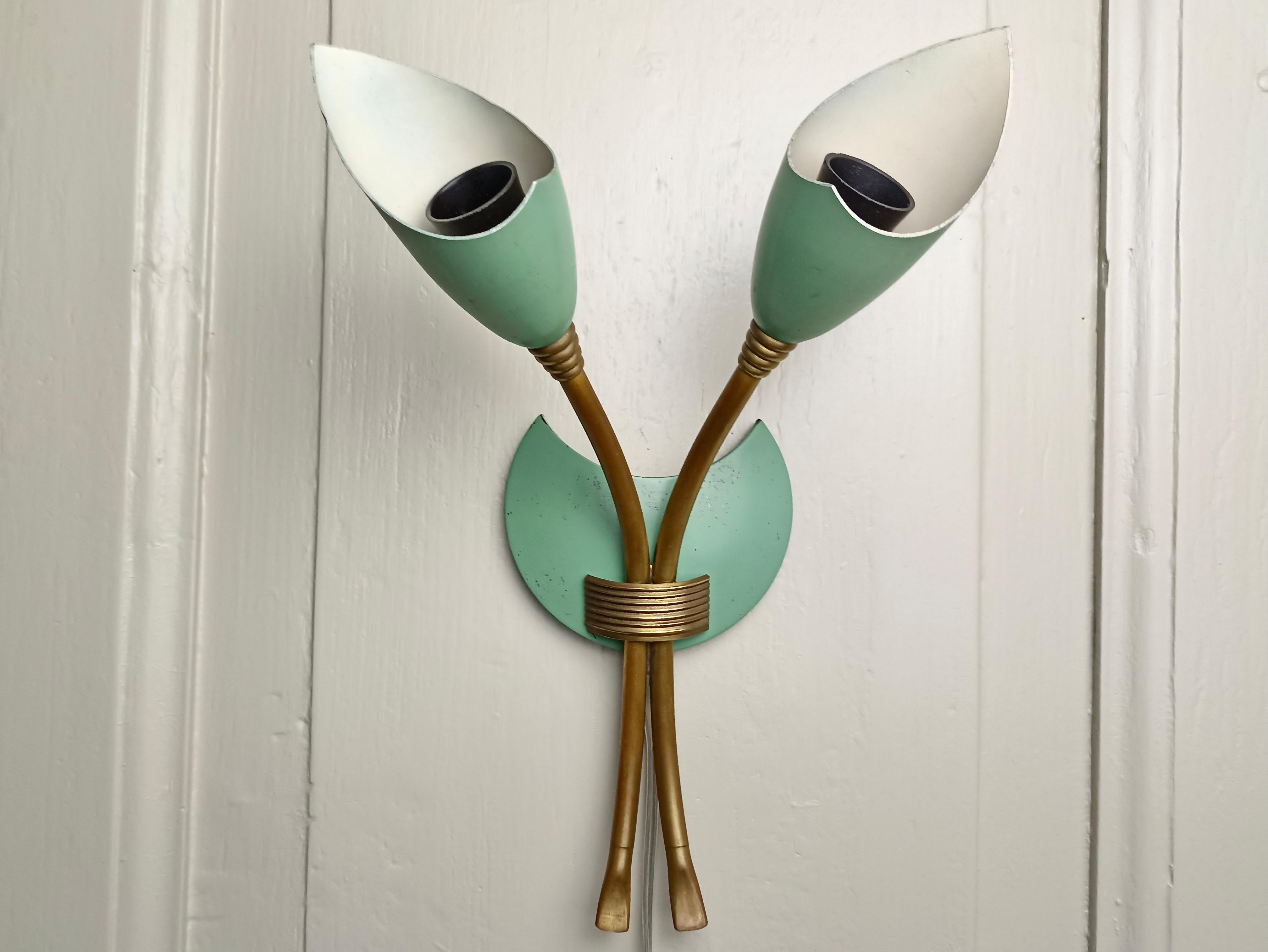 Pretty 1950s two-light rare Italian single wall sconce in brass and light turquoise green lacquered metal, typical of the period. No trademarks are present on the lamp however its design refers to the style of Stilnovo. 
Professionally