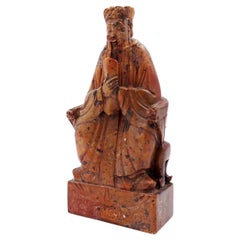 A stone seal carved with a seated official China, 20th