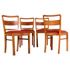 Eine Reihe von vier Stühlen aus Nussbaum und Wurzelholz, neu gepolstert, im Art Deco-Stil