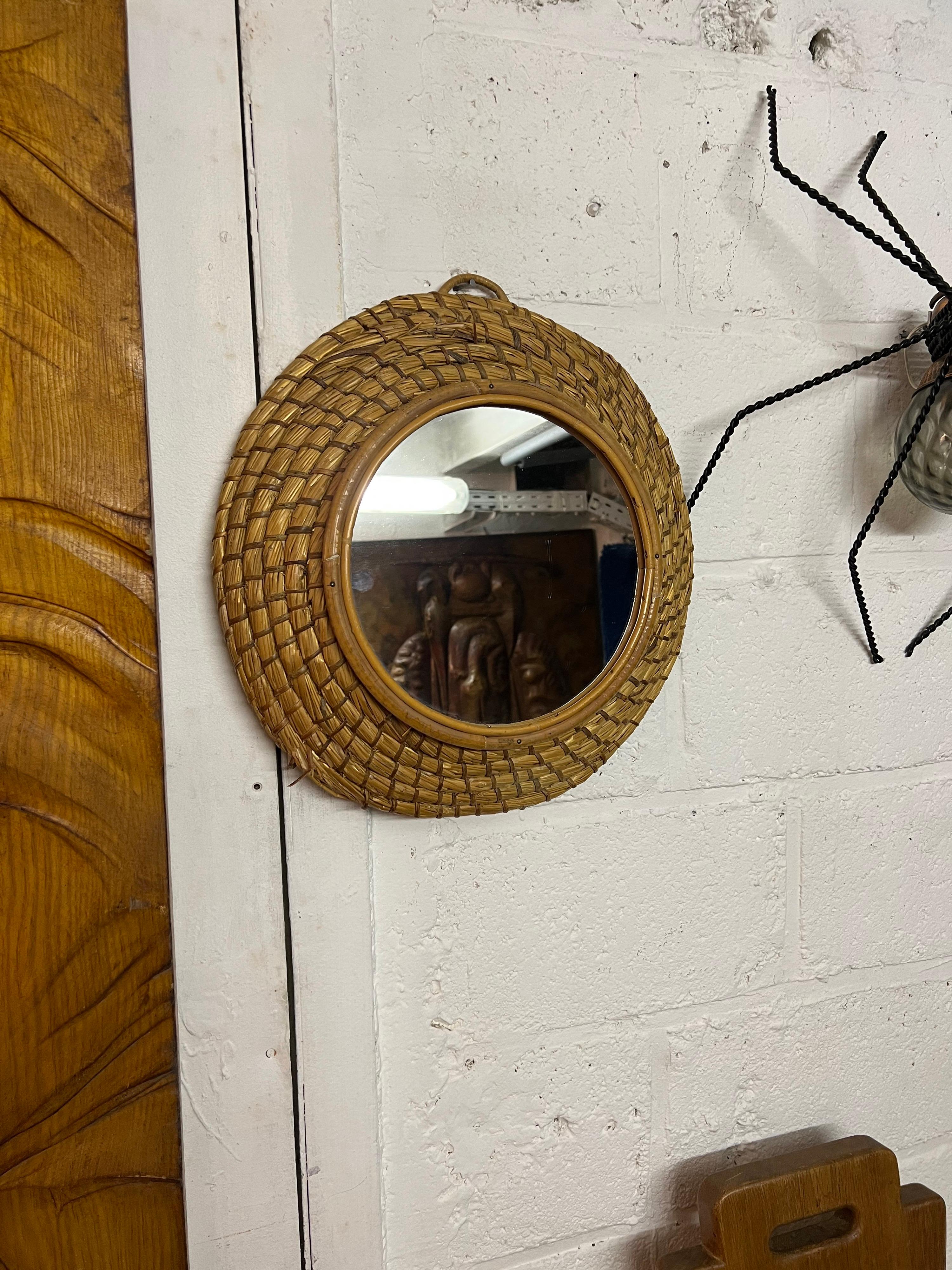 An unusual mirror in straw.