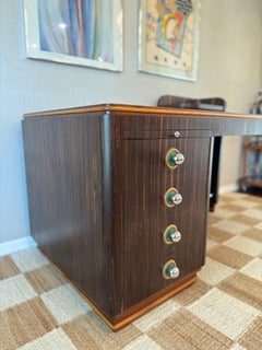 A streamline rosewood desk from the Art Deco era, circa 1930s