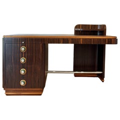 A streamline rosewood desk from the Art Deco era, circa 1930s