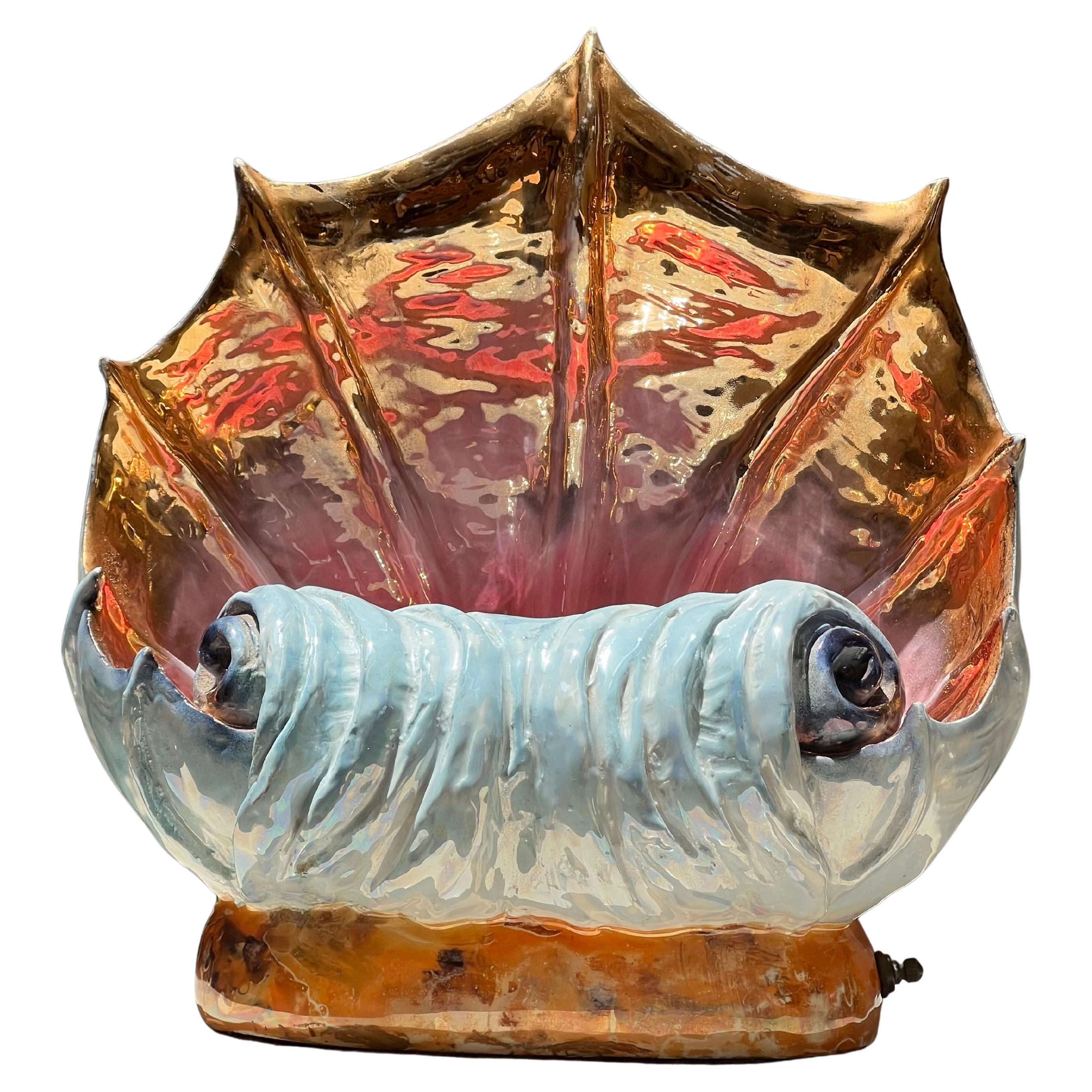 A striking hand-painted conch shell lamp, circa 1960 For Sale