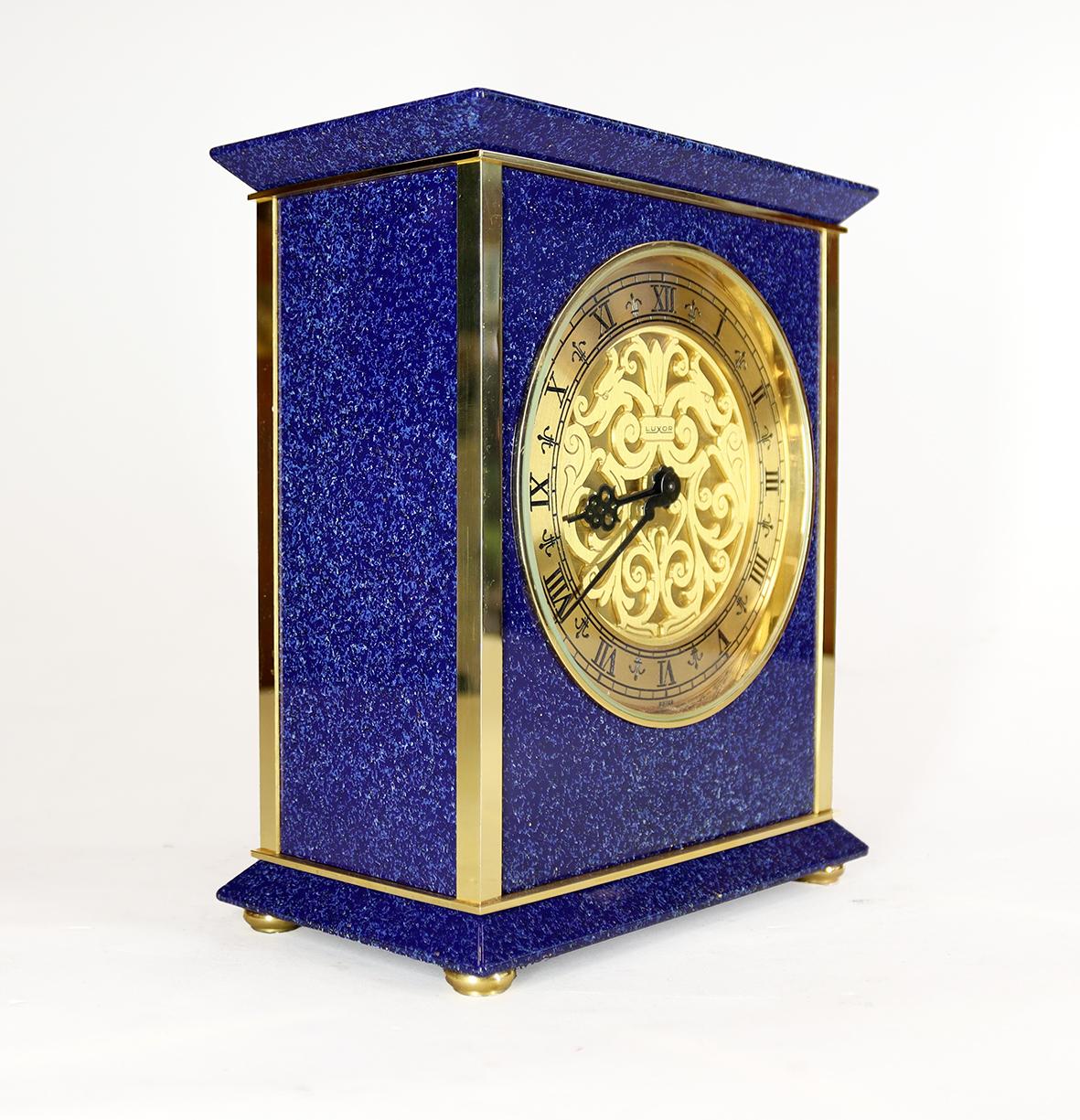 Gold Plate A Striking Mantel Clock by Luxor, in a Lapis Blue and Gilt Case For Sale