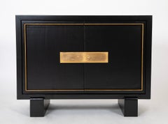 A Striking Mid-Century Two Door Cabinet by Jacques Adnet