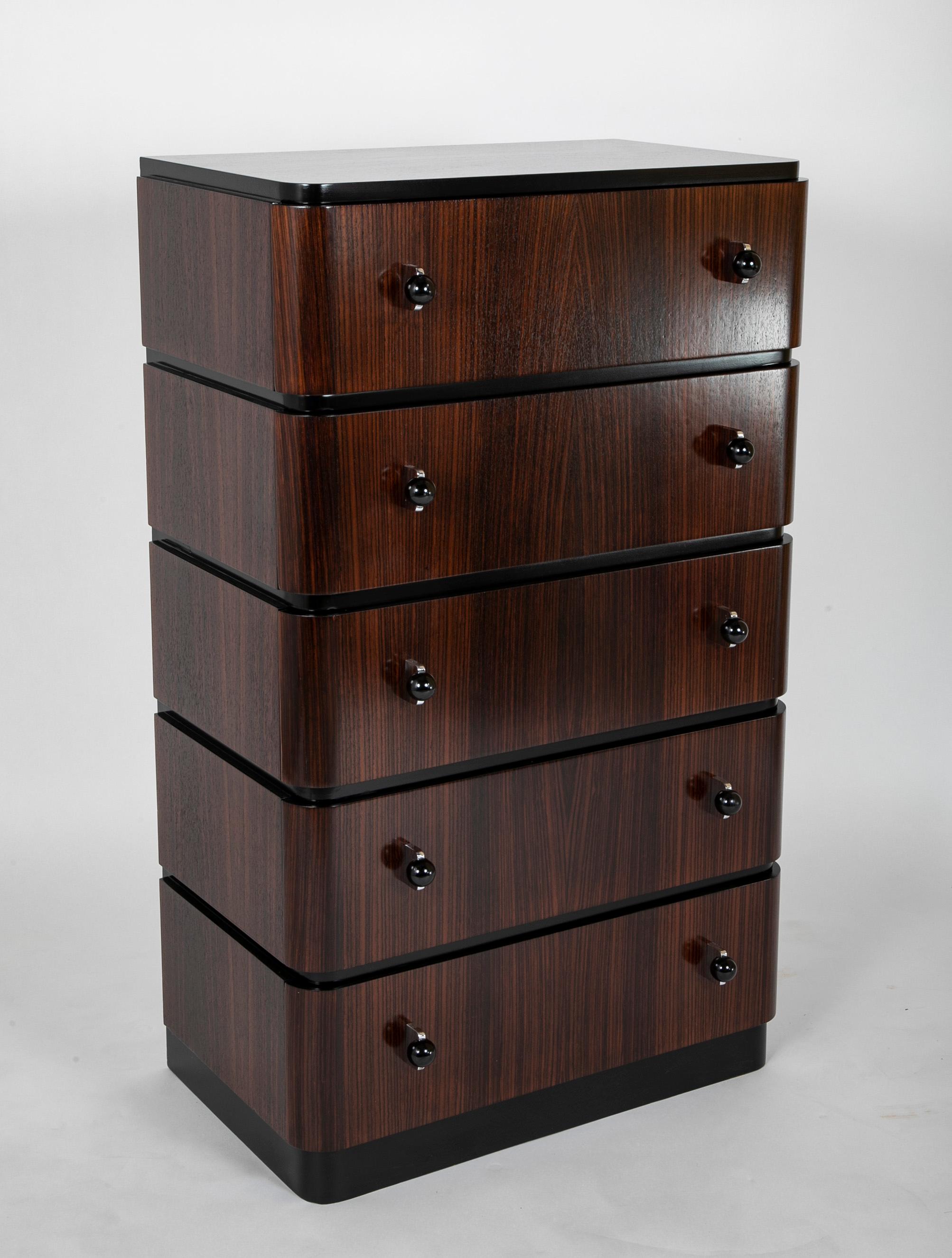 Art Deco A Striking Pair of Indian Rosewood Chests of Drawers by Donald Deskey
