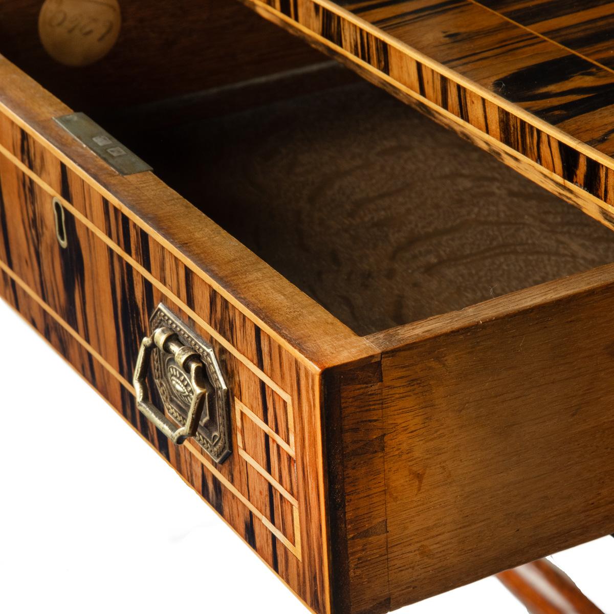 Wood A striking Regency coromandel sofa table For Sale