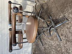 A striking set of 3 swivel bar stools by Daystrom furniture of Boston, featuring