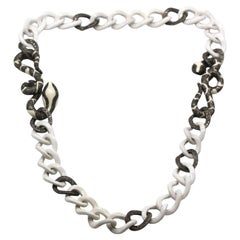 A Striking White Ceramic and Diamond Serpent Necklace