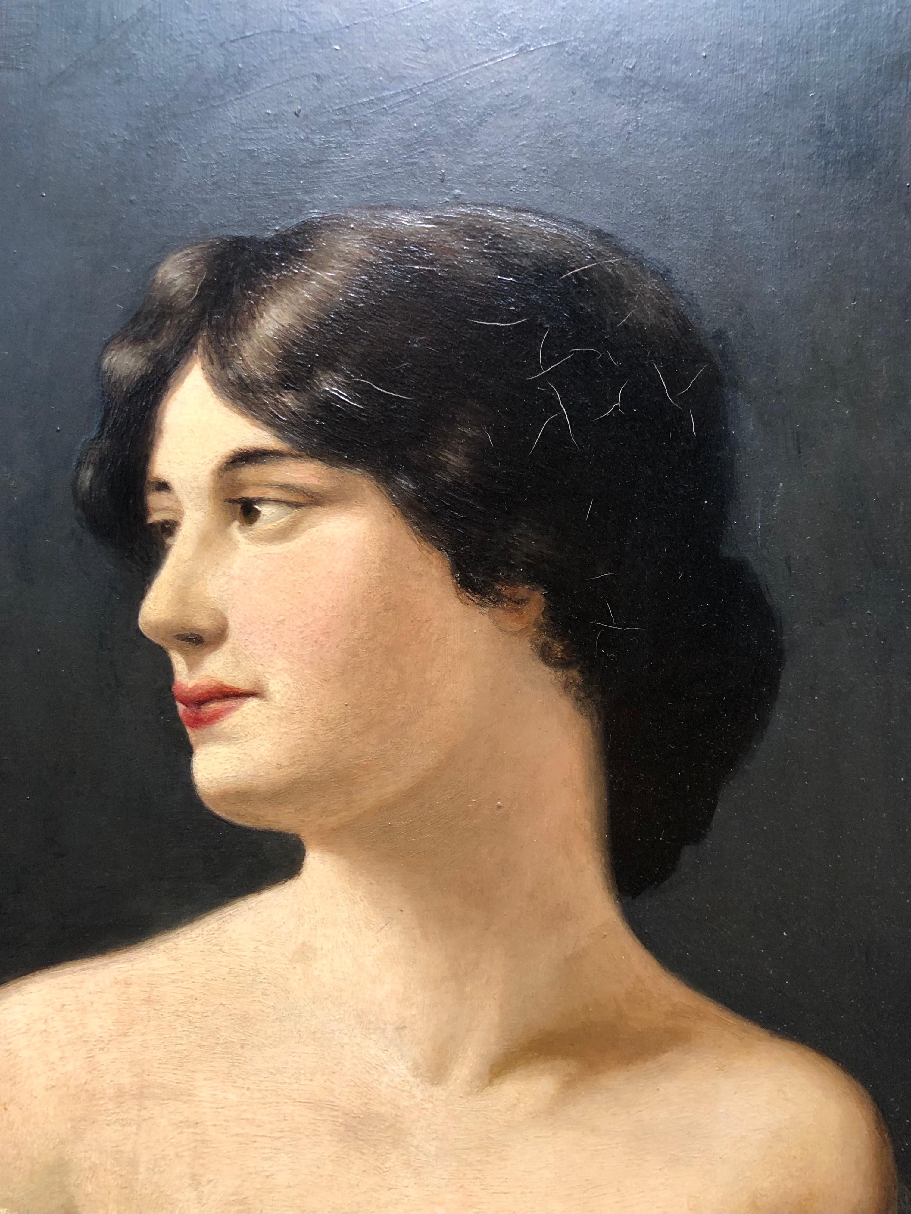 A strikingly beautiful antique oil on board portrait  of a woman. 
Signed on the rear by an unknown artist. 
In great antique condition with no visible signs of repair. 
It has not been out of the frame. 
Measurements are with the frame. 
Some