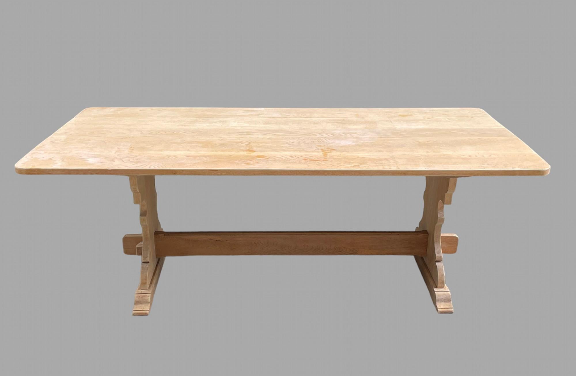 A Good Sized and Proportioned Stripped Oak Trestle Table with great leg room of 72 cm and seat eight comfortably.