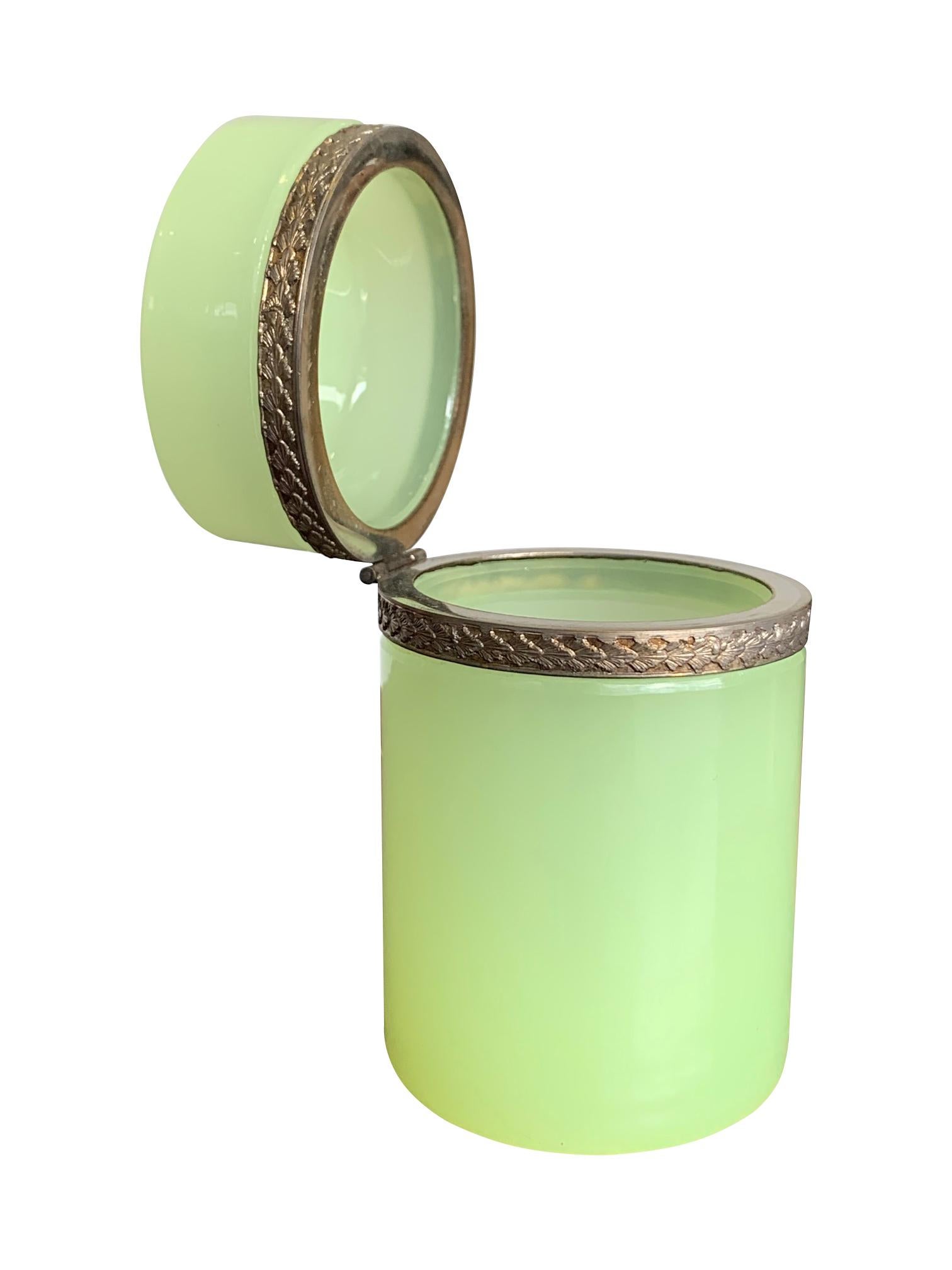 A stunning lime green Murano glass hinged box by Giovanni Cendese, Murano Italy with silvered collar detail and hinge.

 