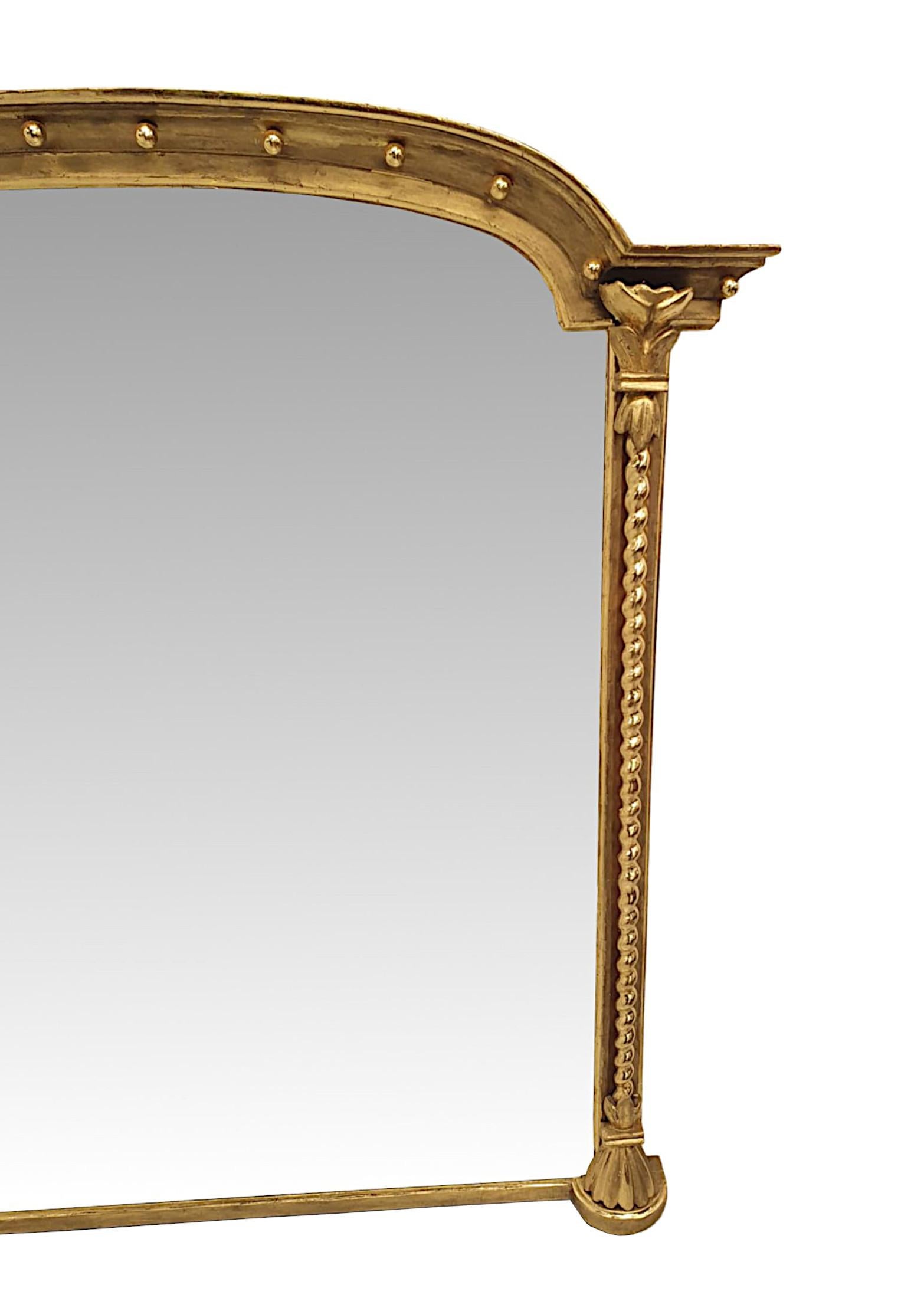 English A Stunning 19th Century Giltwood Overmantle Mirror For Sale