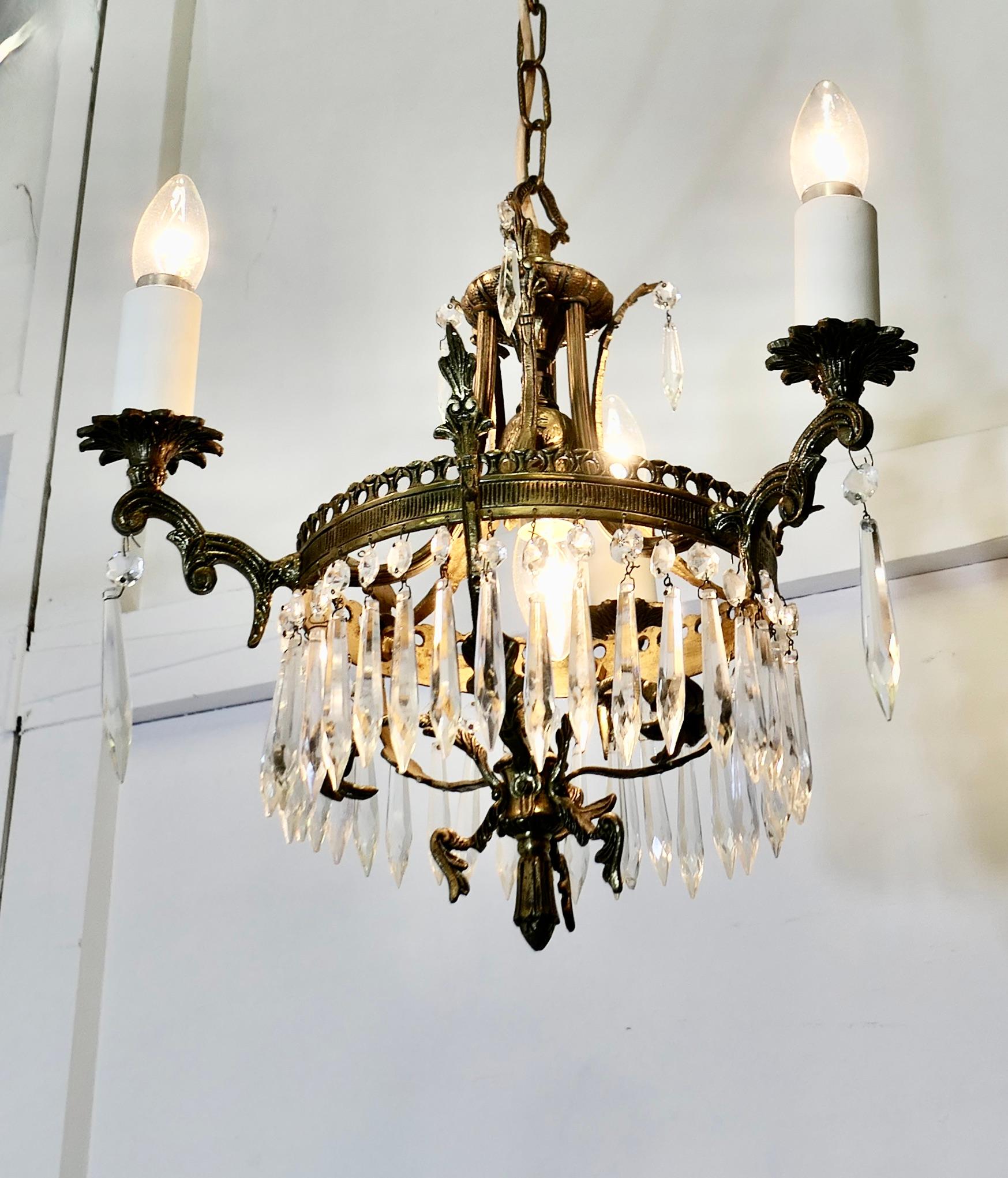 French Provincial A Stunning 3 Branch Brass and Crystal Chandelier   This is excellent quality  For Sale