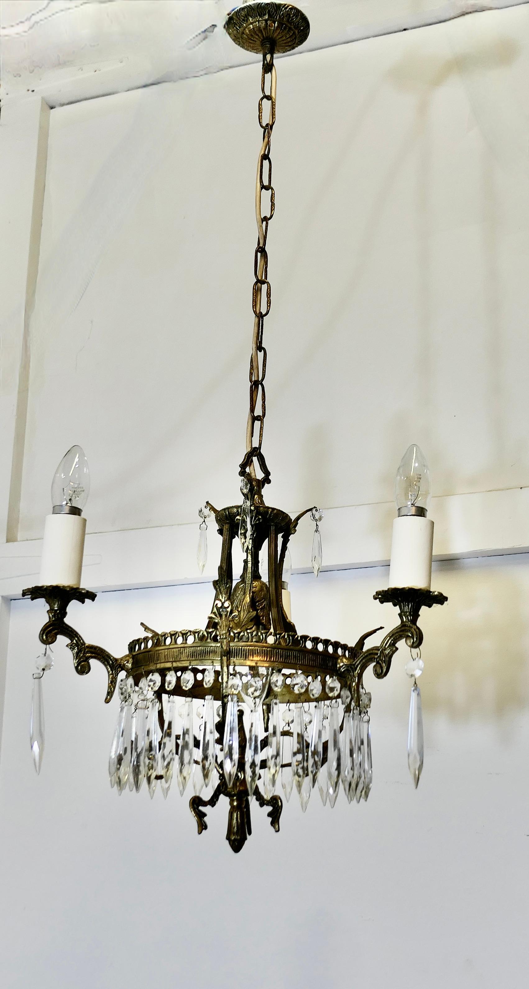 Early 20th Century A Stunning 3 Branch Brass and Crystal Chandelier   This is excellent quality  For Sale