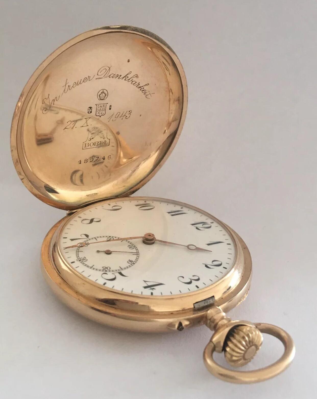 This Handsome Gents full hunter 14K Gold pocket watch is in good working condition and it is ticking nicely 