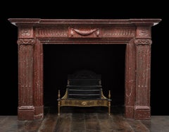 A stunning antique Belloc Griotte marble fireplace / mantel