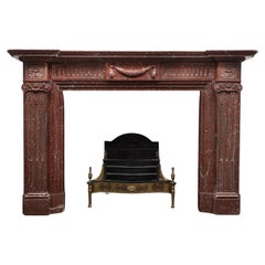 A stunning antique Belloc Griotte marble fireplace / mantel