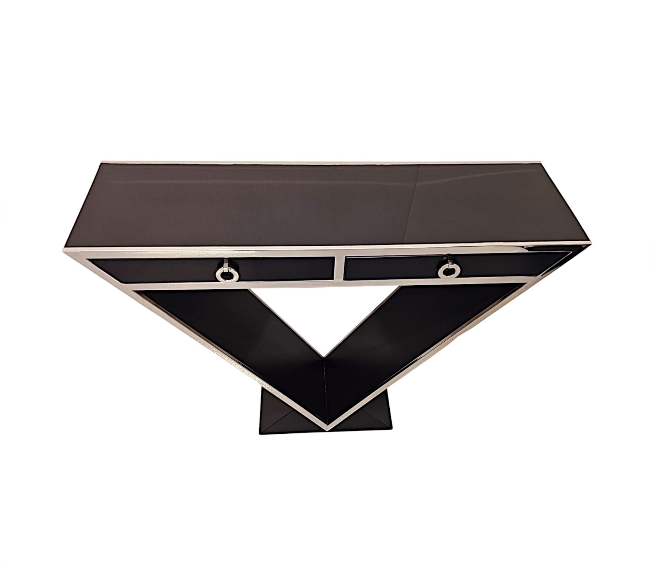 French  A Stunning Art Deco Style Black Laquered Timber and Chrome Console Table For Sale