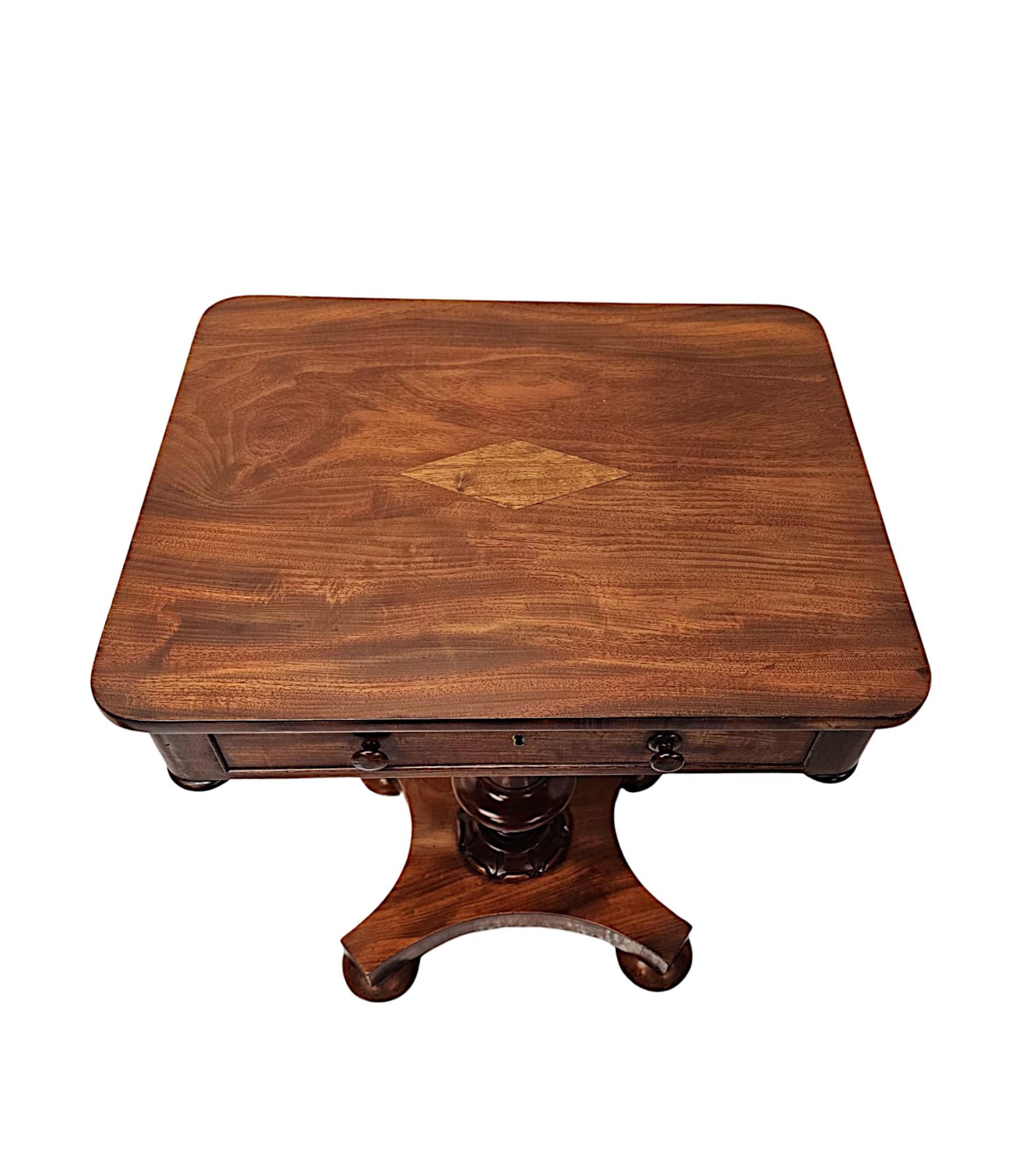 A stunning early 19th Century William IV mahogany lamp, side or centre table, finely hand carved and of exceptional quality with rich patination and grain.  The well figured moulded top of rectangular form with finial detail is embellished to the