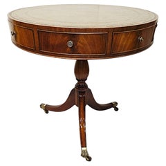A Stunning Early 20th Century Leather Top Revolving Drum Table