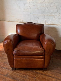 A Stunning French Leather Club Chair, Chapeau de Gendarme Model, C 1950's