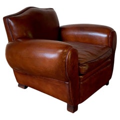 A Stunning French Leather Club Chair, Chapeau de Gendarme Model, C 1950's