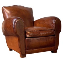 A Stunning French Leather Club Chair, Deep Caramel Moustache Model, Circa 1950’s