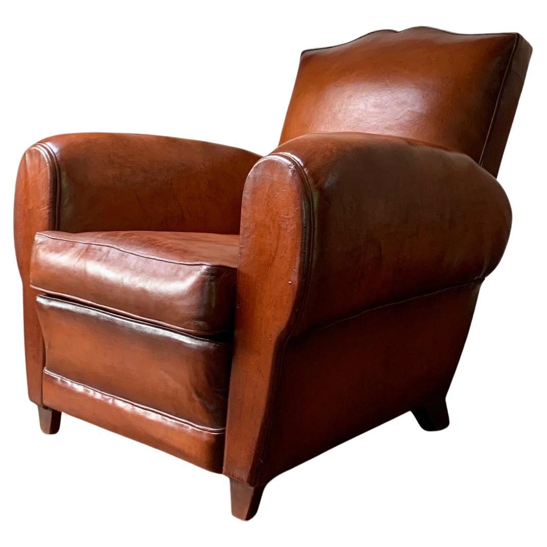 A Stunning French Leather Club Chair, Havana Moustache Model, circa 1950’s