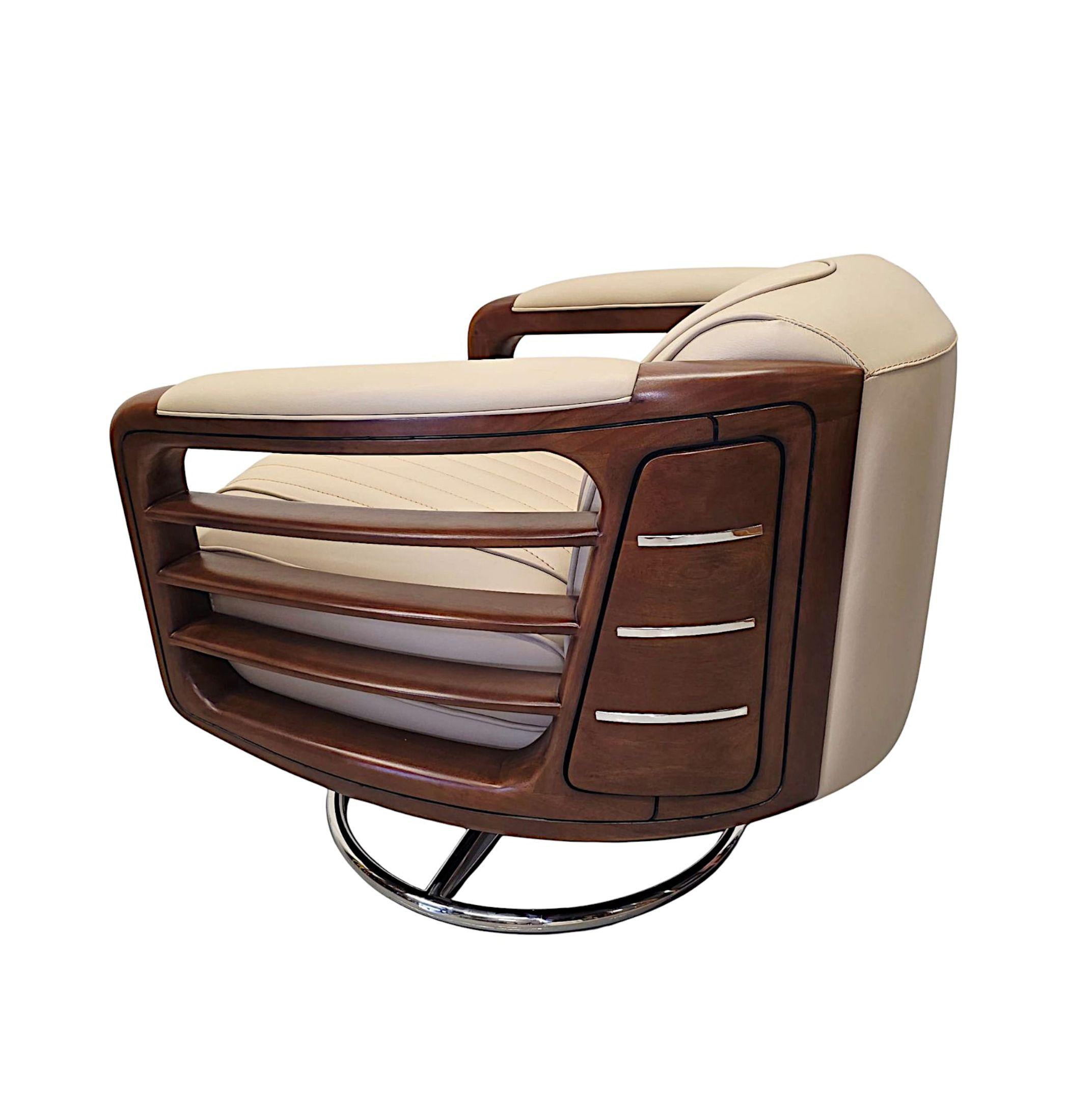French A Stunning Handmade Leather Walnut and Chrome Revolving Armchair For Sale